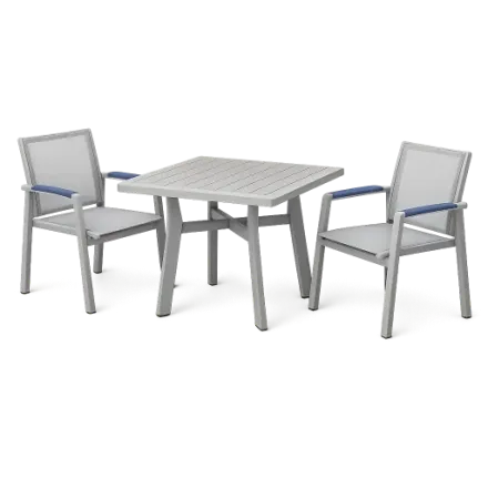 A garden table and two chairs