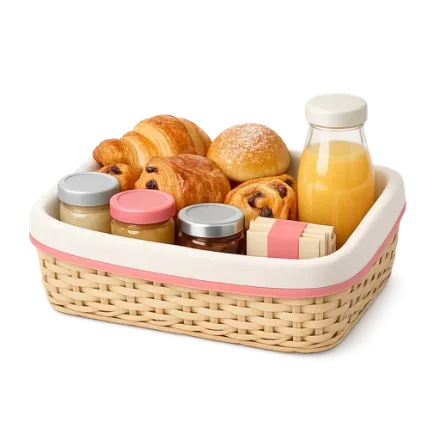A breakfast basket: pastries, juice and jam